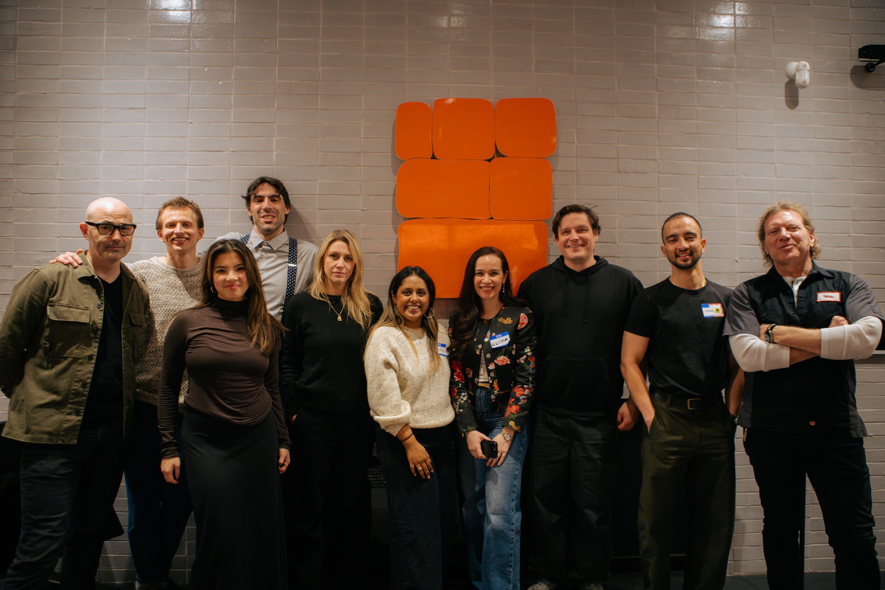 image of the organizing team grouped together and smiling facing the camera